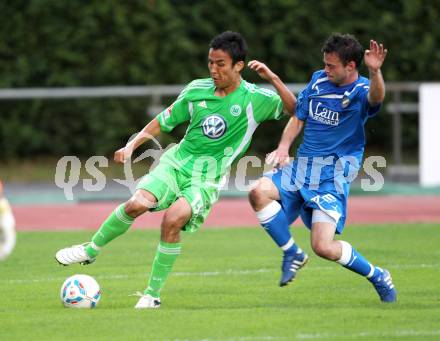 Fussball Testspiel. VSV gegen Vfl Wolfsburg.  Patrick Striednig, (VSV), Makoto Hasebe (Wolfsburg). Villach, 17.7.2011
Foto: Kuess

---
pressefotos, pressefotografie, kuess, qs, qspictures, sport, bild, bilder, bilddatenbank