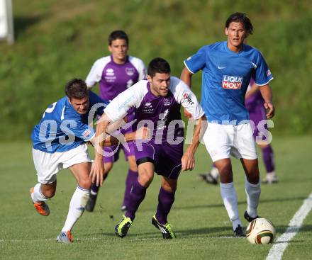 Fussball KFV Cup. ASKOE Koettmannsdorf gegen SK Austria Klagenfurt.  Daniel Globotschnig, Christoph Pibal (Koettmannsdorf), Stephan Buergler(Austria). Koettmannsdorf, am 20.7.2011.
Foto: Kuess
---
pressefotos, pressefotografie, kuess, qs, qspictures, sport, bild, bilder, bilddatenbank