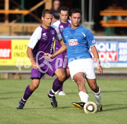 Fussball KFV Cup. ASKOE Koettmannsdorf gegen SK Austria Klagenfurt.  Markus Pink (Koettmannsdorf), Thomas Pirker (Austria). Koettmannsdorf, am 20.7.2011.
Foto: Kuess
---
pressefotos, pressefotografie, kuess, qs, qspictures, sport, bild, bilder, bilddatenbank