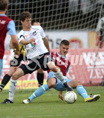 Fussball Bundesliga. Erste Liga. WAC/St. Andrae gegen BW Linz. Christian Falk,  (WAC/St.Andrae), Berthold Teufl (BW Linz). Wolfsberg, 22.7.2011
Foto: Kuess

---
pressefotos, pressefotografie, kuess, qs, qspictures, sport, bild, bilder, bilddatenbank