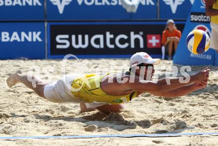 Beachvolleyball Grand Slam.  Pedro Cunha (BRA). Klagenfurt, 7.8.2011
Foto: Kuess

---
pressefotos, pressefotografie, kuess, qs, qspictures, sport, bild, bilder, bilddatenbank