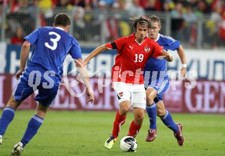 Fussball Laenderspiel Oesterreich gegen Slowakei. Martin Harnik, (Oesterreich),  Lubomir Michalik, Juraj Kucka (Slowakei). Klagenfurt, 10.8.2011.
Foto: Kuess

---
pressefotos, pressefotografie, kuess, qs, qspictures, sport, bild, bilder, bilddatenbank