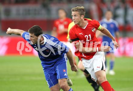 Fussball Laenderspiel Oesterreich gegen Slowakei. Marc Janko, (Oesterreich), Lubomir Michalik  (Slowakei). Klagenfurt, 10.8.2011.
Foto: Kuess

---
pressefotos, pressefotografie, kuess, qs, qspictures, sport, bild, bilder, bilddatenbank