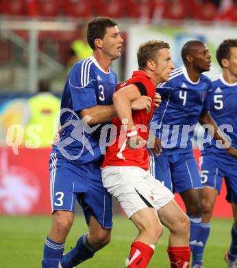 Fussball Laenderspiel Oesterreich gegen Slowakei. Marc Janko,  (Oesterreich), Lubomir Michalek, Karim Guede (Slowakei). Klagenfurt, 10.8.2011.
Foto: Kuess

---
pressefotos, pressefotografie, kuess, qs, qspictures, sport, bild, bilder, bilddatenbank