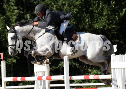 Reiten. Kaerntner Landesmeisterschaften. Klaus Hernler auf Cesar DH. Reifnitz, am 14.8.2011.
Foto: Kuess
---
pressefotos, pressefotografie, kuess, qs, qspictures, sport, bild, bilder, bilddatenbank