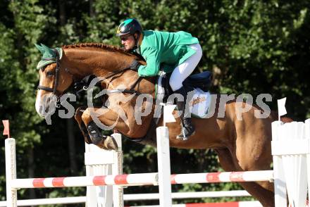 Reiten. Kaerntner Landesmeisterschaften. Dieter Koefler auf Golden Gun. Reifnitz, am 14.8.2011.
Foto: Kuess
---
pressefotos, pressefotografie, kuess, qs, qspictures, sport, bild, bilder, bilddatenbank