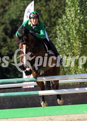 Reiten. Kaerntner Landesmeisterschaften. Markus Stock auf Quick Step 6. Reifnitz, am 14.8.2011.
Foto: Kuess
---
pressefotos, pressefotografie, kuess, qs, qspictures, sport, bild, bilder, bilddatenbank
