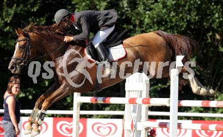 Reiten. Kaerntner Landesmeisterschaften. Michael Walther auf Enjo. Reifnitz, am 14.8.2011.
Foto: Kuess
---
pressefotos, pressefotografie, kuess, qs, qspictures, sport, bild, bilder, bilddatenbank