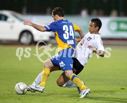 Fussball Bundesliga. Erste Liga. WAC/St. Andrae gegen Vienna. Nenad JOvanovic, (WAC/St.Andrae), Wolfgang Mair (Vienna). Wolfsberg, 19.8.2011
Foto: Kuess

---
pressefotos, pressefotografie, kuess, qs, qspictures, sport, bild, bilder, bilddatenbank