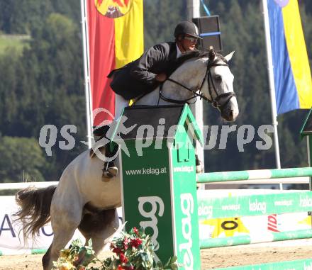 Reiten. Kaerntner Landesmeisterschaften. Klaus Hernler auf Cesar DH. Reifnitz, am 14.8.2011.
Foto: Kuess
---
pressefotos, pressefotografie, kuess, qs, qspictures, sport, bild, bilder, bilddatenbank