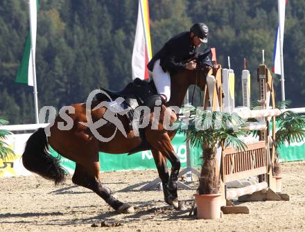 Reiten. Kaerntner Landesmeisterschaften. Andreas Bauer auf Lando 281. Reifnitz, am 14.8.2011.
Foto: Kuess
---
pressefotos, pressefotografie, kuess, qs, qspictures, sport, bild, bilder, bilddatenbank