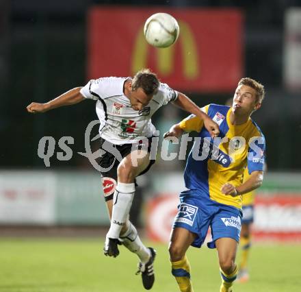 Fussball Bundesliga. Erste Liga. WAC/St. Andrae gegen Vienna. Gernot Messner, (WAC/St.Andrae), Mario Kroepfl (Vienna). Wolfsberg, 19.8.2011
Foto: Kuess

---
pressefotos, pressefotografie, kuess, qs, qspictures, sport, bild, bilder, bilddatenbank