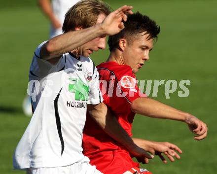 Fussball Unterliga Ost. Ludmannsdorf gegen KAC. Christian Glantschnig (Ludmannsdorf). Gerhasrd Gratzer (KAC). Ludmannsdorf, am 21.8.2011.
Foto: Kuess
---
pressefotos, pressefotografie, kuess, qs, qspictures, sport, bild, bilder, bilddatenbank