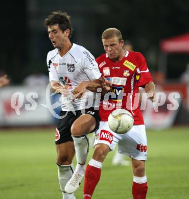 Fussball Bundesliga. Erste Liga. WAC/St. Andrae gegen SKN St. Poelten.  Mihret Topcagic (WAC/St.Andrae),  Michael Popp (St. Poelten). Wolfsberg, 26.8.2011
Foto: Kuess

---
pressefotos, pressefotografie, kuess, qs, qspictures, sport, bild, bilder, bilddatenbank