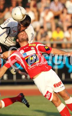 Fussball Bundesliga. Erste Liga. WAC/St. Andrae gegen SKN St. Poelten.  Mihret Topcagic (WAC/St.Andrae),  Markus Speiser (St. Poelten). Wolfsberg, 26.8.2011
Foto: Kuess

---
pressefotos, pressefotografie, kuess, qs, qspictures, sport, bild, bilder, bilddatenbank