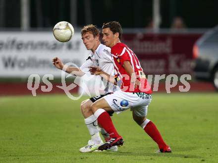 Fussball Bundesliga. Erste Liga. WAC/St. Andrae gegen SKN St. Poelten.  Mathias Berchtold (WAC/St.Andrae),  Michael Ambichl (St. Poelten). Wolfsberg, 26.8.2011
Foto: Kuess

---
pressefotos, pressefotografie, kuess, qs, qspictures, sport, bild, bilder, bilddatenbank