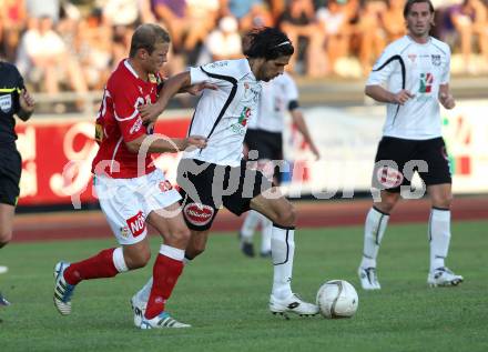 Fussball Bundesliga. Erste Liga. WAC/St. Andrae gegen SKN St. Poelten.  Jacobo (WAC/St.Andrae),  Michael Popp (St. Poelten). Wolfsberg, 26.8.2011
Foto: Kuess

---
pressefotos, pressefotografie, kuess, qs, qspictures, sport, bild, bilder, bilddatenbank