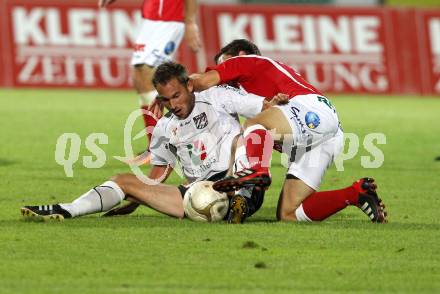 Fussball Bundesliga. Erste Liga. WAC/St. Andrae gegen SKN St. Poelten.  Gernot Messner WAC/St.Andrae), Michael Ambichl (St. Poelten). Wolfsberg, 26.8.2011
Foto: Kuess

---
pressefotos, pressefotografie, kuess, qs, qspictures, sport, bild, bilder, bilddatenbank