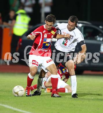 Fussball Bundesliga. Erste Liga. WAC/St. Andrae gegen SKN St. Poelten.  Hannes Franz Jochum (WAC/St.Andrae), Michael Ambichl  (St. Poelten). Wolfsberg, 26.8.2011
Foto: Kuess

---
pressefotos, pressefotografie, kuess, qs, qspictures, sport, bild, bilder, bilddatenbank