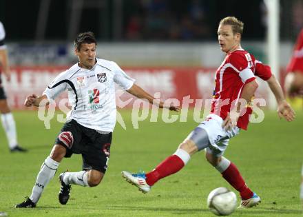 Fussball Bundesliga. Erste Liga. WAC/St. Andrae gegen SKN St. Poelten.  Markus Kreuz (WAC/St.Andrae),  Jochen Fallmann (St. Poelten). Wolfsberg, 26.8.2011
Foto: Kuess

---
pressefotos, pressefotografie, kuess, qs, qspictures, sport, bild, bilder, bilddatenbank