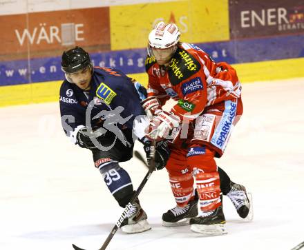 Eishockey Testspiel KAC gegen ERC Ingolstadt. Lammers John (KAC), Thomas Greilinger (ERC Ingolstadt). Klagenfurt, 28.8.2011.
Foto: Kuess 

---
pressefotos, pressefotografie, kuess, qs, qspictures, sport, bild, bilder, bilddatenbank