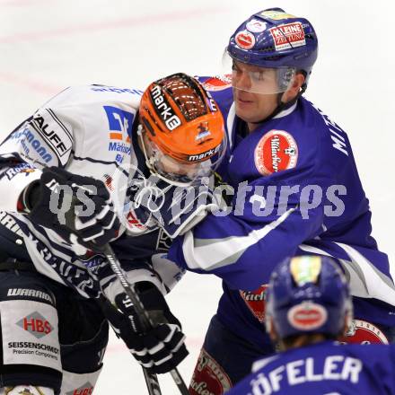 EBEL. Eishockey Bundesliga. EC Pasut VSV gegen Iserlohn Roosters. Kevin Mitchell,  (VSV), Thomas Holzmann  (Iserlohn Roosters). Villach, am 28.8.2011.
Foto: Kuess 


---
pressefotos, pressefotografie, kuess, qs, qspictures, sport, bild, bilder, bilddatenbank