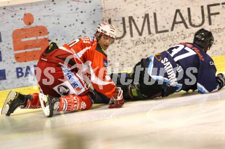 Eishockey Testspiel KAC gegen ERC Ingolstadt. Lammers John (KAC), Rick Girard (ERC Ingolstadt). Klagenfurt, 28.8.2011.
Foto: Kuess 

---
pressefotos, pressefotografie, kuess, qs, qspictures, sport, bild, bilder, bilddatenbank
