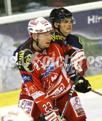 Eishockey Testspiel KAC gegen ERC Ingolstadt. Siklenka Mike (KAC), Tyler Bouck (ERC Ingolstadt). Klagenfurt, 28.8.2011.
Foto: Kuess 

---
pressefotos, pressefotografie, kuess, qs, qspictures, sport, bild, bilder, bilddatenbank