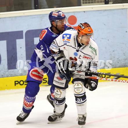 EBEL. Eishockey Bundesliga. EC Pasut VSV gegen Iserlohn Roosters. Greg Kuznik,  (VSV), Robert Hock (Iserlohn Roosters). Villach, am 28.8.2011.
Foto: Kuess 


---
pressefotos, pressefotografie, kuess, qs, qspictures, sport, bild, bilder, bilddatenbank