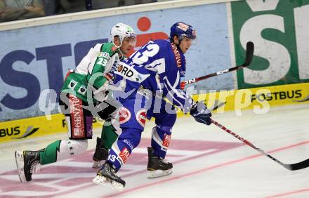 EBEL. Eishockey Bundesliga. EC Rekord Fenster VSV gegen HDD TILIA Olimpija Ljubljana. Benjami Petrik, (VSV), Damjan Dervaric  (Laibach). Villach, am 9.9.2011.
Foto: Kuess 


---
pressefotos, pressefotografie, kuess, qs, qspictures, sport, bild, bilder, bilddatenbank