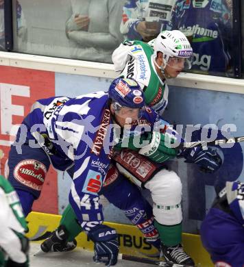 EBEL. Eishockey Bundesliga. EC Rekord Fenster VSV gegen HDD TILIA Olimpija Ljubljana.  Mario Altmann, (VSV), Erik Pance (Laibach). Villach, am 9.9.2011.
Foto: Kuess 


---
pressefotos, pressefotografie, kuess, qs, qspictures, sport, bild, bilder, bilddatenbank