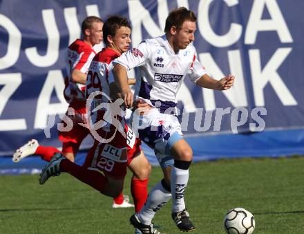 Fussball Regionalliga. SAK gegen GAK. Darijo Biscan (SAK), Michael Hofer (GAK). Klagenfurt, am 10.11.2011.
Foto: Kuess
---
pressefotos, pressefotografie, kuess, qs, qspictures, sport, bild, bilder, bilddatenbank