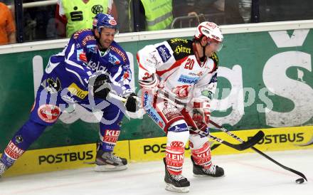 EBEL. Eishockey Bundesliga. EC Rekord Fenster VSV gegen EC KAC. Tomaz Razingar,  (VSV), John Lammers (KAC). Villach, am 18.9.2011.
Foto: Kuess 


---
pressefotos, pressefotografie, kuess, qs, qspictures, sport, bild, bilder, bilddatenbank