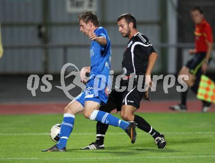 Fussball OEFB Cup. VSV gegen Hartberg. Nico Hrstic (VSV), Cem Atan (Hartberg). Villach, am 20.9.2011.
Foto: Kuess
---
pressefotos, pressefotografie, kuess, qs, qspictures, sport, bild, bilder, bilddatenbank