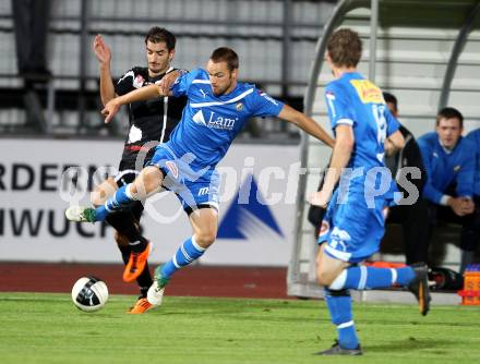 Fussball OEFB Cup. VSV gegen Hartberg. Udo Gasser (VSV), Rexhe Bytyci (Hartberg). Villach, am 20.9.2011.
Foto: Kuess
---
pressefotos, pressefotografie, kuess, qs, qspictures, sport, bild, bilder, bilddatenbank