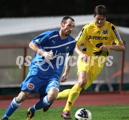 Fussball. Regionalliga. VSV gegen Pasching. Rok Pavlicic, (VSV), Patrick Pircher (Pasching). Villach, 23.9.2011. 
Foto: Kuess

---
pressefotos, pressefotografie, kuess, qs, qspictures, sport, bild, bilder, bilddatenbank