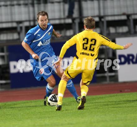 Fussball. Regionalliga. VSV gegen Pasching. Stefan Friessnegger, (VSV), Philipp Schobesberger (Pasching). Villach, 23.9.2011. 
Foto: Kuess

---
pressefotos, pressefotografie, kuess, qs, qspictures, sport, bild, bilder, bilddatenbank