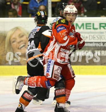 EBEL. Eishockey Bundesliga.  KAC gegen Graz 99ers. SPURGEON Tyler (KAC), LANGE Harry (Graz). Klagenfurt, 23.9.2011.
Foto: Kuess 

---
pressefotos, pressefotografie, kuess, qs, qspictures, sport, bild, bilder, bilddatenbank