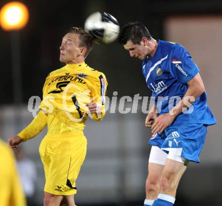 Fussball. Regionalliga. VSV gegen Pasching.  Julian Brandstaetter, (VSV), Oliver Stadlbauer (Pasching). Villach, 23.9.2011. 
Foto: Kuess

---
pressefotos, pressefotografie, kuess, qs, qspictures, sport, bild, bilder, bilddatenbank