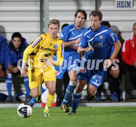 Fussball. Regionalliga. VSV gegen Pasching. Stefan Friessnegger, (VSV), Oliver Stadlbauer (Pasching). Villach, 23.9.2011. 
Foto: Kuess

---
pressefotos, pressefotografie, kuess, qs, qspictures, sport, bild, bilder, bilddatenbank