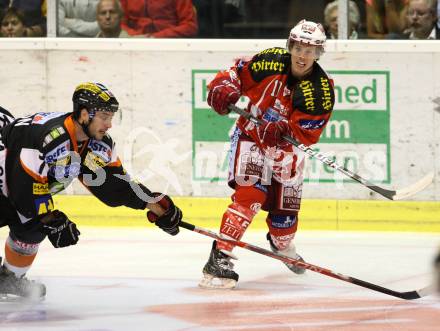 EBEL. Eishockey Bundesliga.  KAC gegen Graz 99ers. SCOFIELD Tyler (KAC), BISAILLON Sebastien (Graz). Klagenfurt, 23.9.2011.
Foto: Kuess 

---
pressefotos, pressefotografie, kuess, qs, qspictures, sport, bild, bilder, bilddatenbank