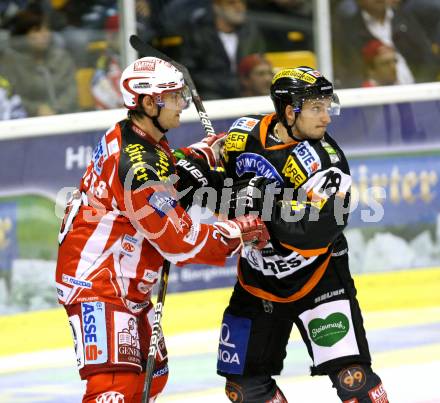 EBEL. Eishockey Bundesliga.  KAC gegen Graz 99ers. LAMMERS John
 (KAC), LEMBACHER Robert (Graz). Klagenfurt, 23.9.2011.
Foto: Kuess 

---
pressefotos, pressefotografie, kuess, qs, qspictures, sport, bild, bilder, bilddatenbank