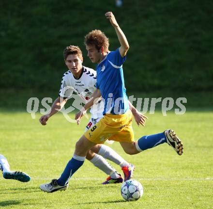 Fussball Kaerntner Liga. Feldkirchen gegen SVG Bleiburg. Thomas Sick (Feldkirchen), Benjamin Opietnik (Bleiburg). Feldkirchen, am 24.9.2011.
Foto: Kuess 
---
pressefotos, pressefotografie, kuess, qs, qspictures, sport, bild, bilder, bilddatenbank