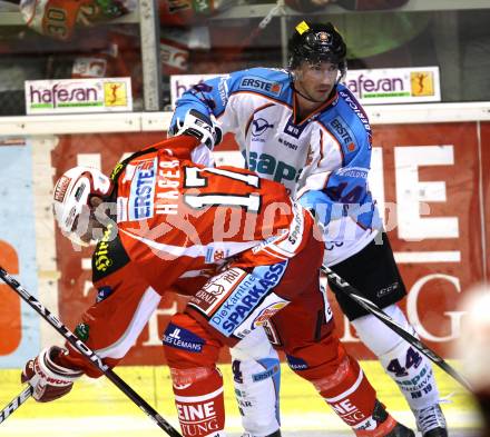 EBEL. Eishockey Bundesliga.  KAC gegen SAPA Fehervar AV19. Gregor Hager, (KAC), Juray Durco (Alba Volan). Klagenfurt, 25.9.2011.
Foto: Kuess 

---
pressefotos, pressefotografie, kuess, qs, qspictures, sport, bild, bilder, bilddatenbank