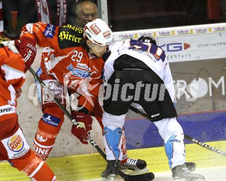 EBEL. Eishockey Bundesliga.  KAC gegen SAPA Fehervar AV19. Christoph Brandner,  (KAC), Christian Borgatello (Alba Volan). Klagenfurt, 25.9.2011.
Foto: Kuess 

---
pressefotos, pressefotografie, kuess, qs, qspictures, sport, bild, bilder, bilddatenbank