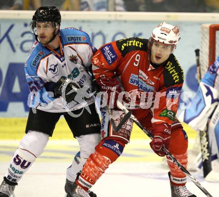 EBEL. Eishockey Bundesliga.  KAC gegen SAPA Fehervar AV19. Tyler Spurgeon, (KAC), Christian Burgatello (Alba Volan). Klagenfurt, 25.9.2011.
Foto: Kuess 

---
pressefotos, pressefotografie, kuess, qs, qspictures, sport, bild, bilder, bilddatenbank