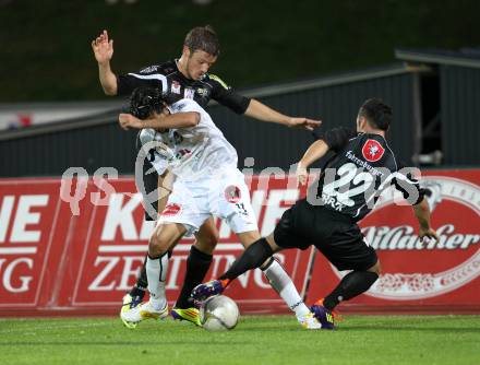 Fussball. Erste Liga. RZ Pellets WAC/St. Andrae gegen Cashpoint SCR Altach. Jacobo,  (WAC), Harun Erbek (Altach). Wolfsberg, 30.9.2011. 
Foto: Kuess

---
pressefotos, pressefotografie, kuess, qs, qspictures, sport, bild, bilder, bilddatenbank