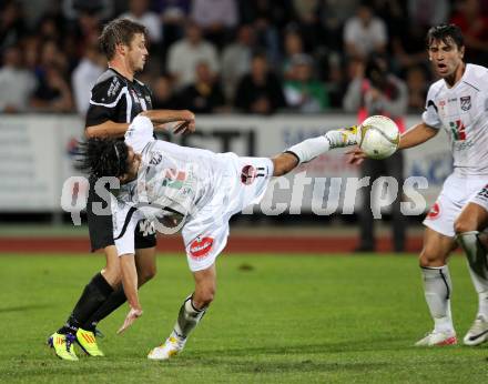 Fussball. Erste Liga. RZ Pellets WAC/St. Andrae gegen Cashpoint SCR Altach. Jacobo, (WAC), Hannes Eder  (Altach). Wolfsberg, 30.9.2011. 
Foto: Kuess

---
pressefotos, pressefotografie, kuess, qs, qspictures, sport, bild, bilder, bilddatenbank