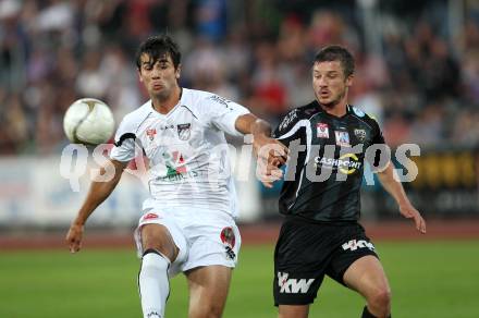 Fussball. Erste Liga. RZ Pellets WAC/St. Andrae gegen Cashpoint SCR Altach. Mihret Topcagic,  (WAC), Hannes Eder (Altach). Wolfsberg, 30.9.2011. 
Foto: Kuess

---
pressefotos, pressefotografie, kuess, qs, qspictures, sport, bild, bilder, bilddatenbank