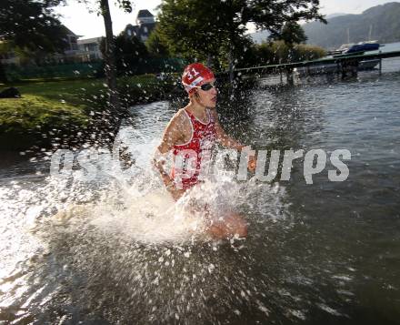 Triathlon. Laufen, Schwimmen, Radfahren. Lisa Perterer. 
Klagenfurt, 22.9.2011.
Foto: Kuess
---
pressefotos, pressefotografie, kuess, qs, qspictures, sport, bild, bilder, bilddatenbank